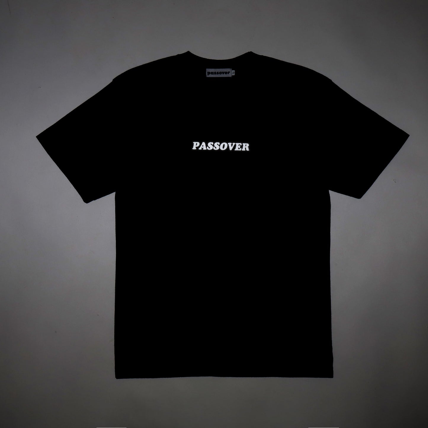 PASSOVER FRONT TEE BLACK/REFLECT